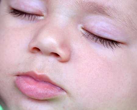 Adorable cute little baby sleepの写真素材