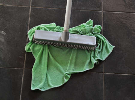 Mop with green ragの写真素材