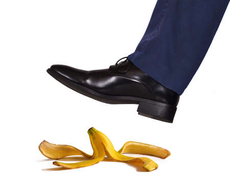 Foot stepping on bananaの写真素材