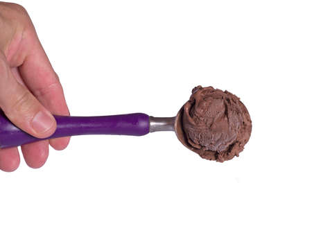Dark chocolate ice cream ball on spoon