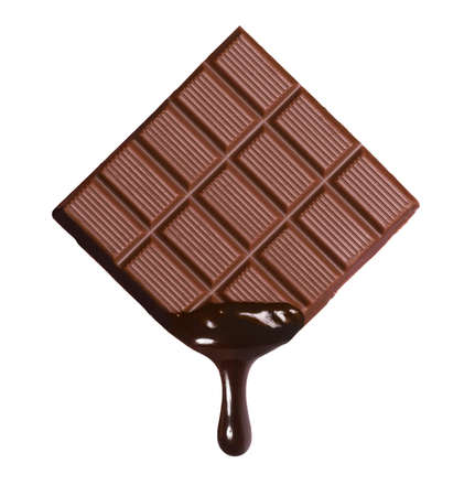 Dark chocolate bar and melted brewing drop on white background.の写真素材
