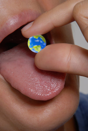 Eating the world concept on mouth