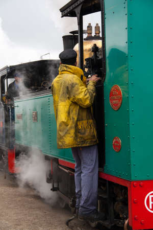 Old locomotive and driver in the region Picardy - Franceの写真素材