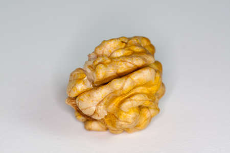 Walnut kernels on white の写真素材