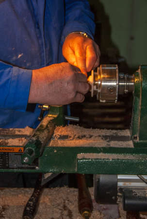 Working on a wood lathe