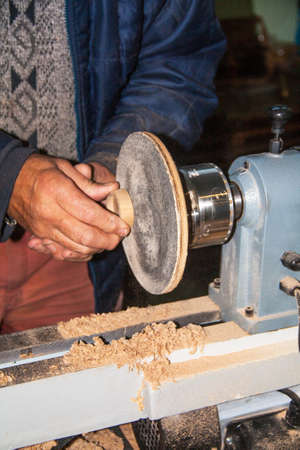 Working on a wood lathe