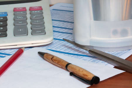 calculator, pen, pencil, on desktop