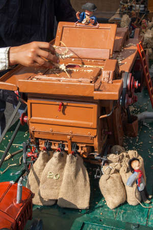 Reduced model of old combine harvester