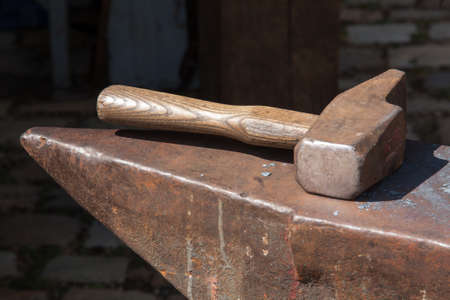 Hammer resting on anvil