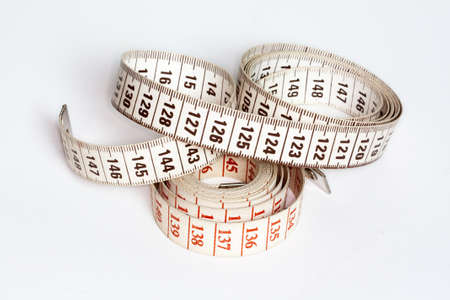 Couturire meter ribbon wound on white background