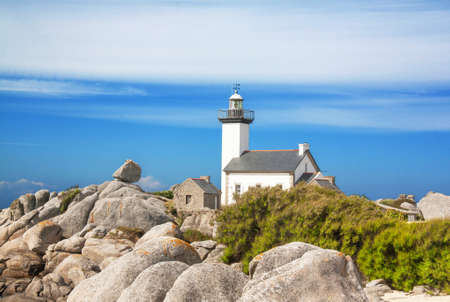 Lighthouse on rocky spur Portusval has Brignogan, Finistereの写真素材