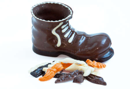 Chocolate shoes on white backgroundの写真素材