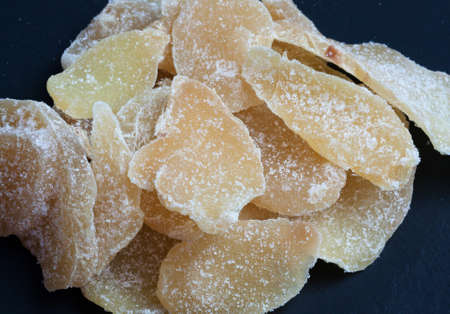 Candied ginger background \ 's slateの写真素材