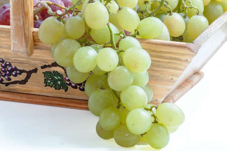 White grapes in a basket in bulk