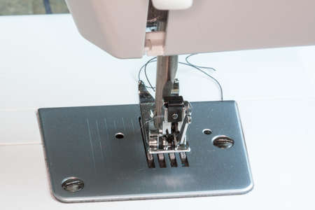 Close-up of sewing machine head