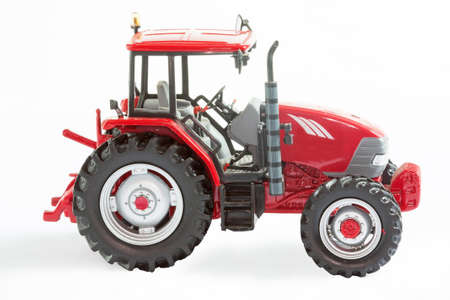 Toy scale model of plastic tractorの写真素材