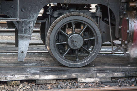 And bogie wheel on old steam locomotive