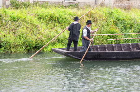 Coulon. Boatmen on the Sevre Niortaise. Marais Poitevin, Poitou Charentes, Deux Sevres