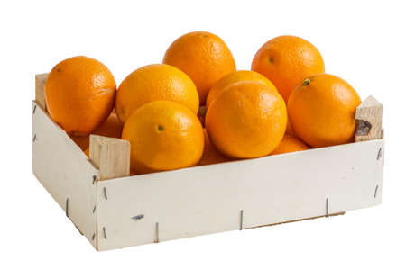 Oranges in a crate on a white backgroundの写真素材