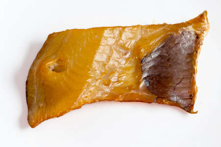 Smoked salmon pavé on a white backgroundの写真素材