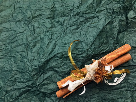 Traditional Christmas spices - Star anise with cinnamon and cloves on background.の写真素材