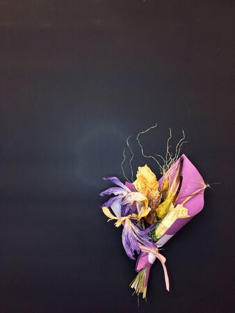 Beautiful dry flower bouquet on black background.の写真素材