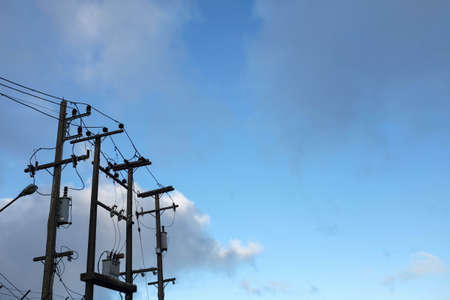 electricity post with skyの写真素材