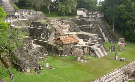 Tical maya site over green grass and tropical jungleの写真素材