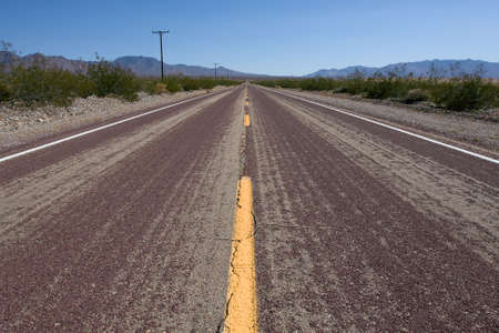 Old route 66 at daytime with green bush