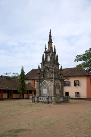 Indian temple in Kerala over blue sky with green treesの写真素材