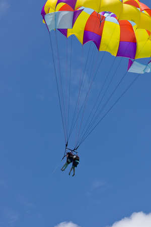 Two parasailers enjoying a nice glide togetherの写真素材