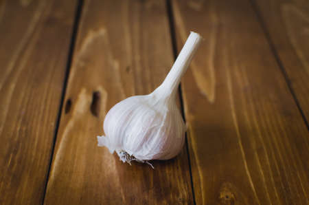 Garlic Bulb on wooden tableの写真素材