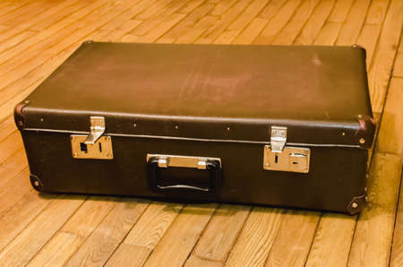 Vintage classic brown leather suitcase. Travel conceptの写真素材