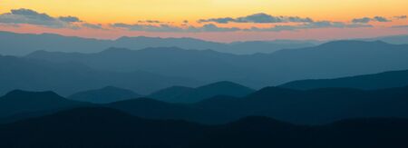 Sunset over the Cowee Mtns off of the Blue Ridge Parkwayの写真素材