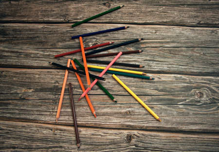 background from color pencils on green paperの写真素材