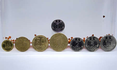 Close up of coins to stack of coins, Business Growth concept, There is money coins to stack of coins. Financial risk.の写真素材
