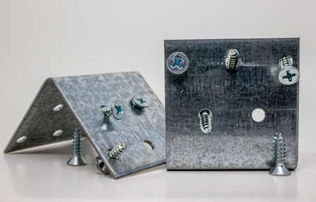 bolt and nut isolated on white backgroundの写真素材