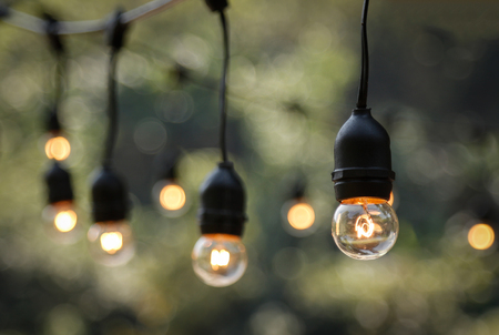 Shining vintage lamp in dark low light evening