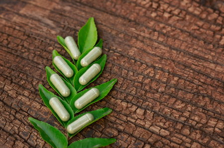 herbal powder medicine in capsules  for healthy eatingの写真素材