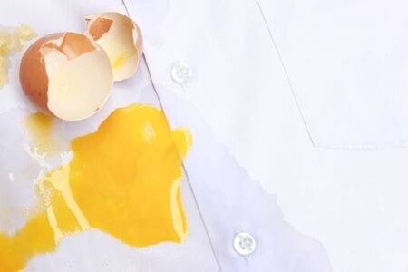 dirty broken egg stain from cooking in kitchen for cleaning concept