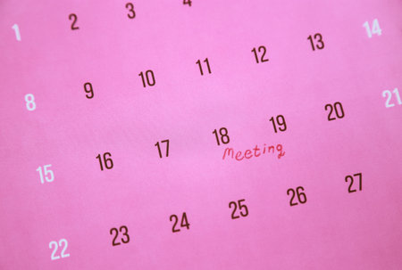 Meeting word write on calendar for reminder in meeting timeの写真素材