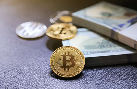 Selective focus on bitcoin with uprising trade chart of bitcoins, future of electric money using in...