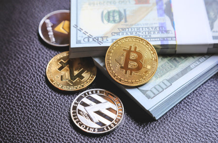 Selective focus on bitcoin with uprising trade chart of bitcoins, future of electric money using in...