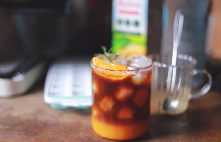 homemade orange Americano coffee from free time making drink for healthy living life. selective focusの写真素材