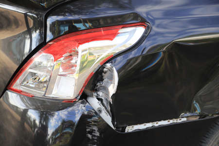 Car crashed on rear light and surface from accident in using car in daily life for insurance photo conceptの写真素材