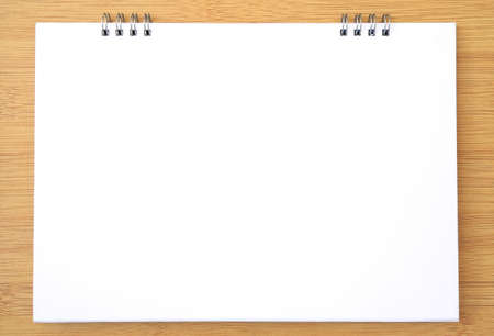 White blank paper background on wooden for create creative wallpaper work design for editing....