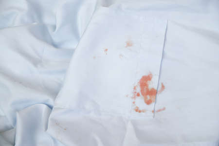 dity cosmetic stain on cloth from using in daily life for cleaning concept