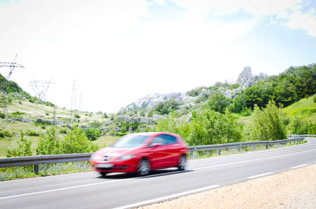 Trip with a car on highwayの写真素材