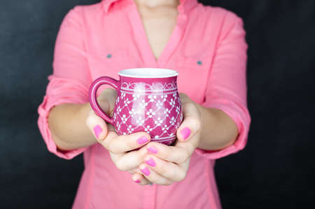 Your woman holding empty cupの写真素材