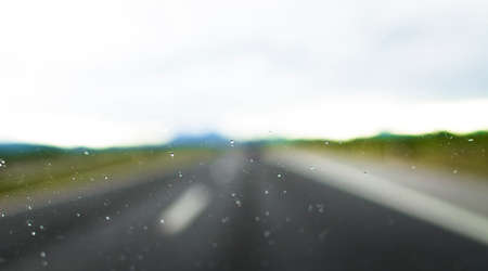 Trip with a car on highwayの写真素材